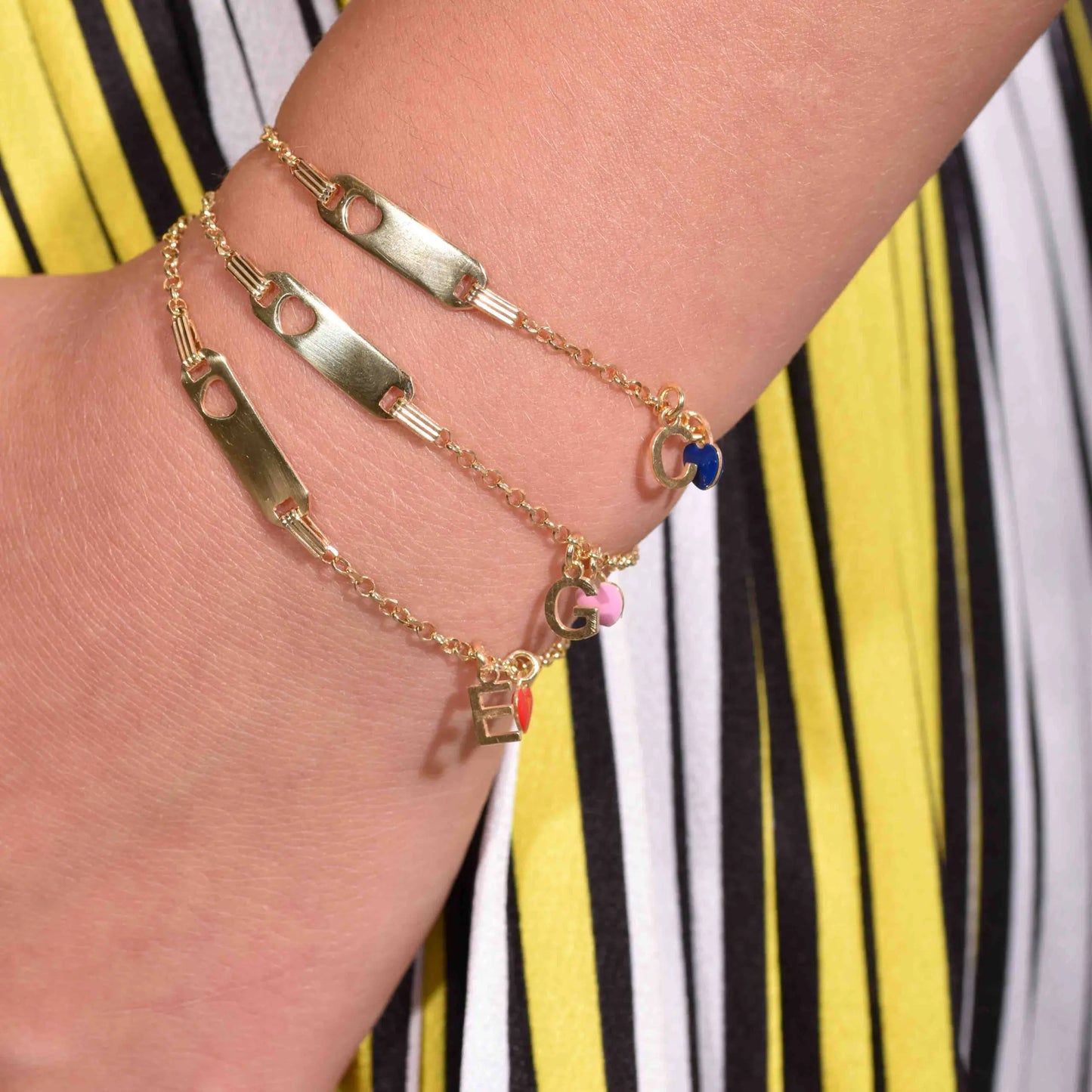 Bracciale in argento 925 giallo con cuore rosso