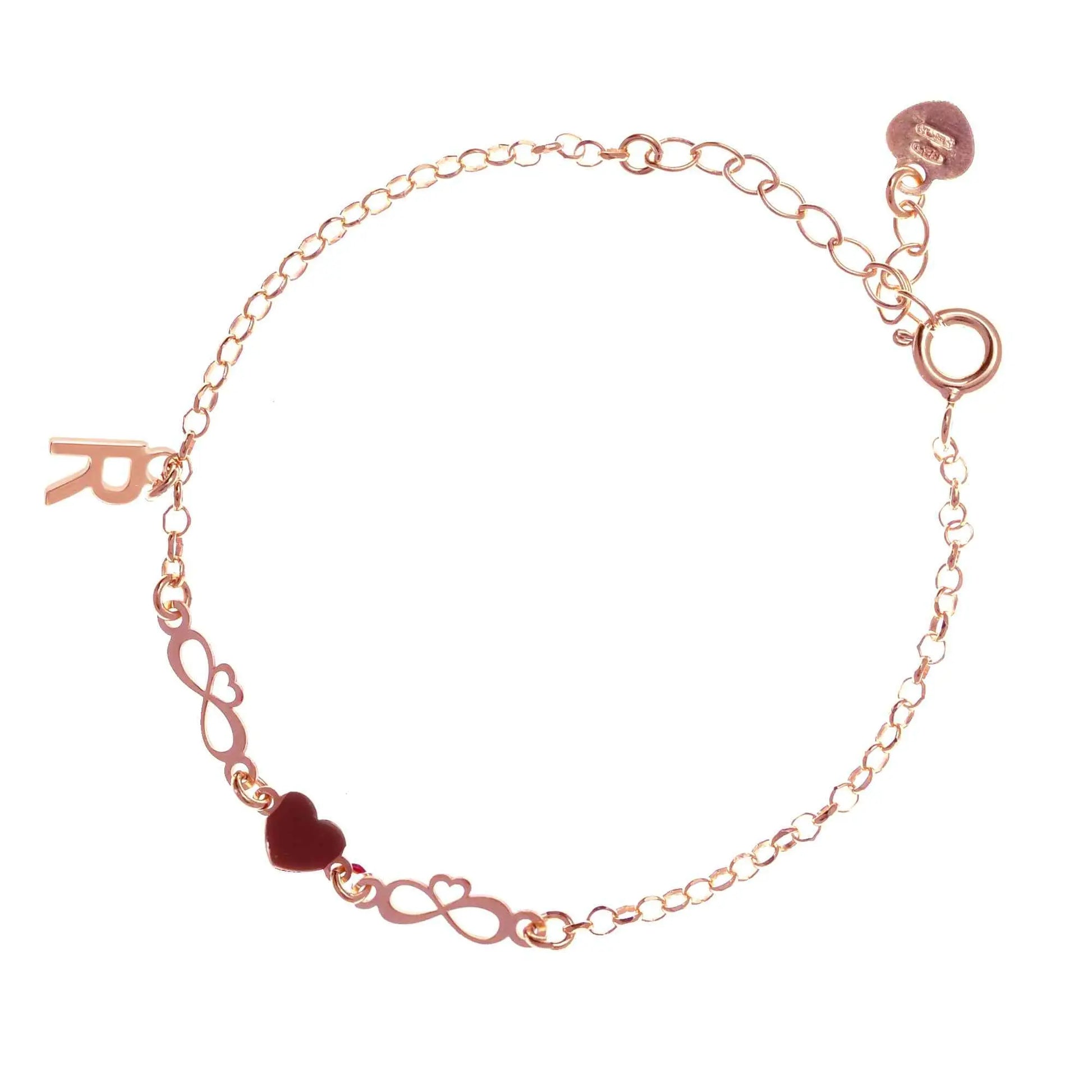 Bracciale regolabile in argento 925 rose’ con due infinito sagomati, cuore smaltato rosso e letterina pendente.