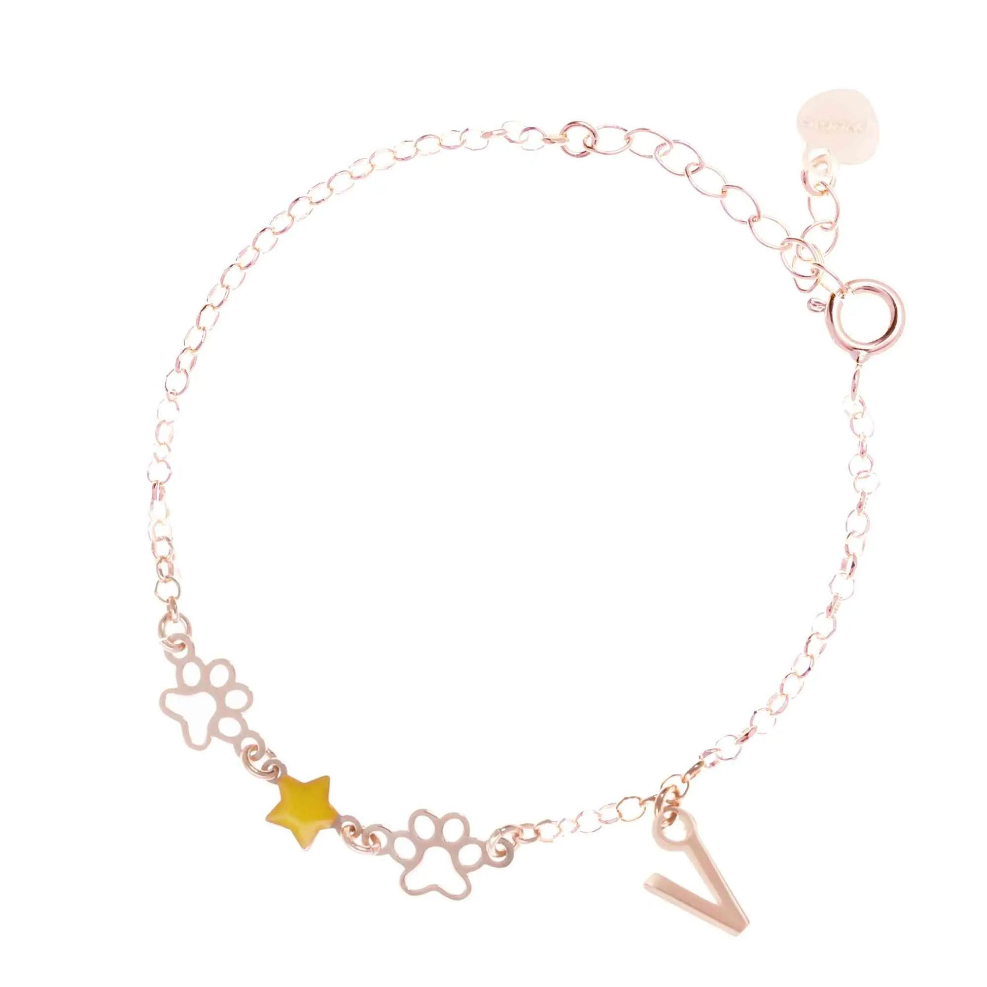 Bracciale regolabile in argento 925 rose’ con due zampine sagomate, stella smaltata gialla e letterina pendente.