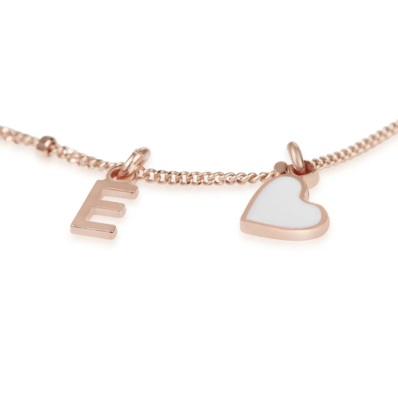 Bracciale Megghy con pendente cuore bianco e lettera