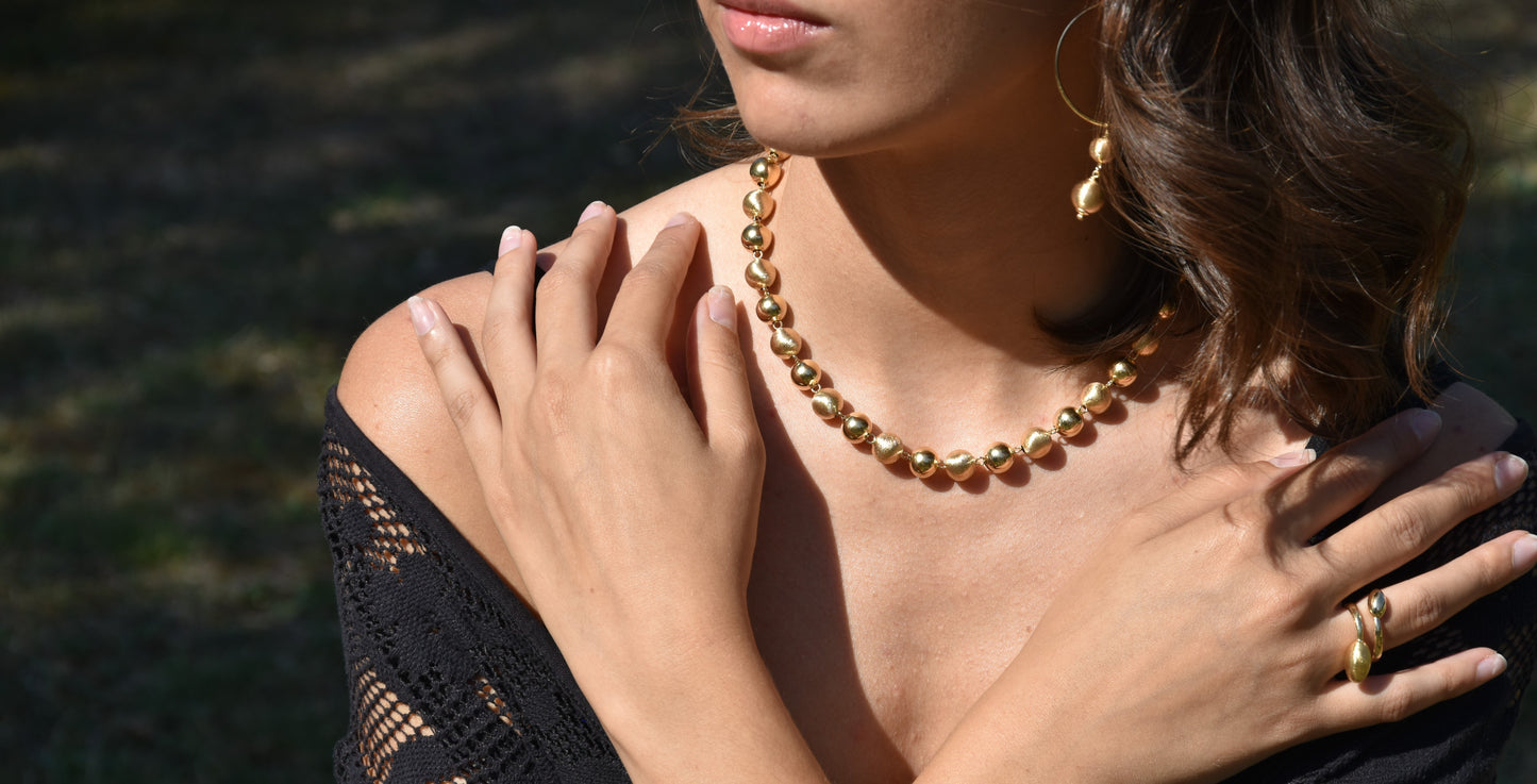 Collana in argento 925 e laminatura in Oro 24K, con sfere setate dorate.